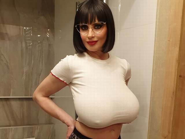 Lisa Bukawski lifts her top